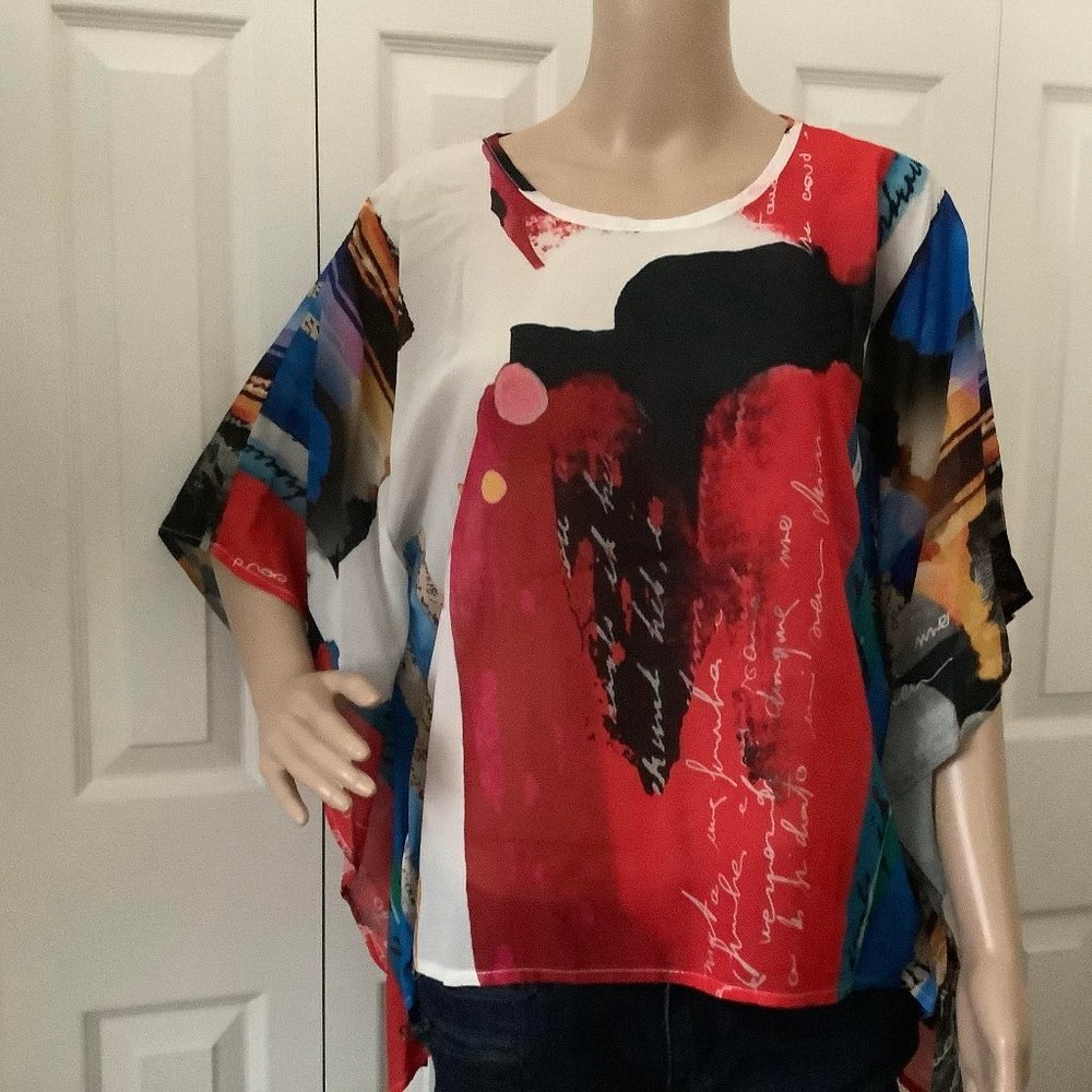 WOMEN'S PRINT PONCHO  COMES IN SIZES S/M  AND L/XL